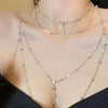 CrystalGlam™ Rhinestone Tassel Body Chain – Sparkling Chest Jewelry